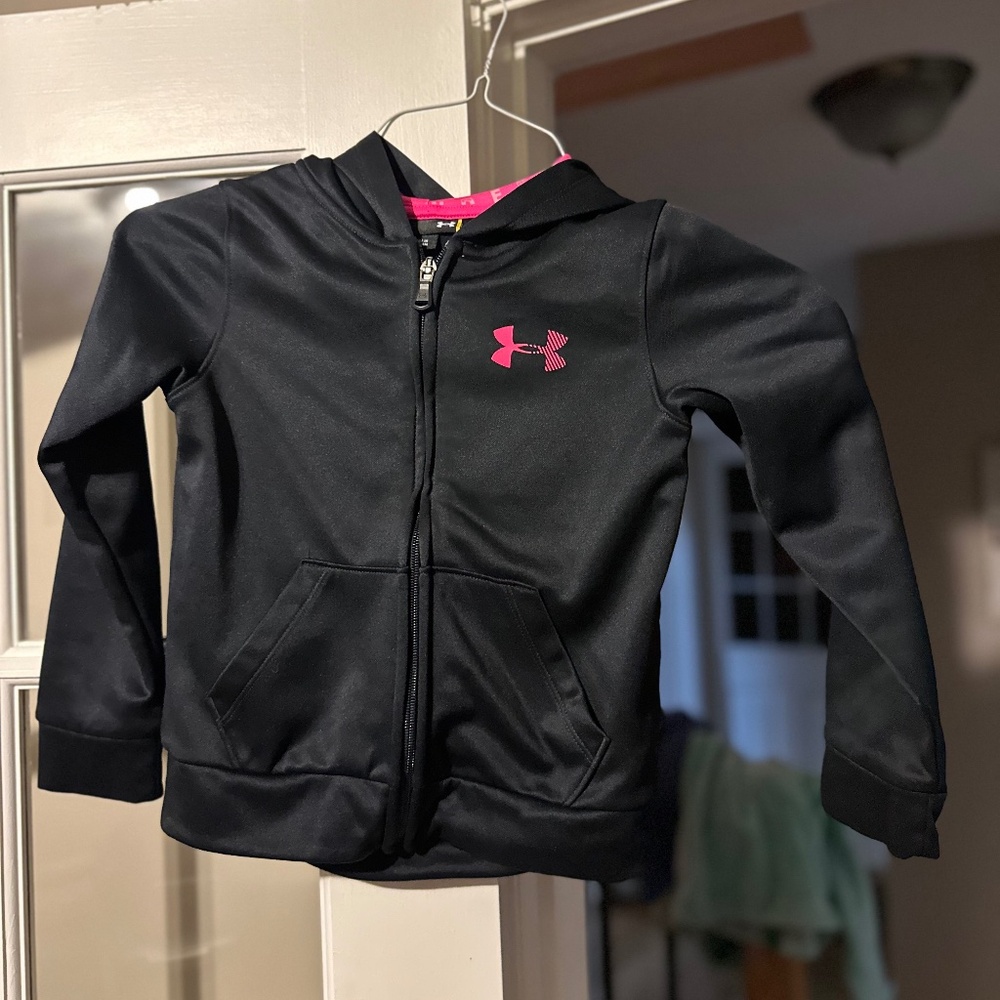 Girl under Armour jacket